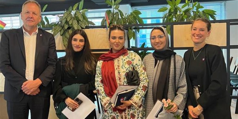 Panel of judges with the contestants