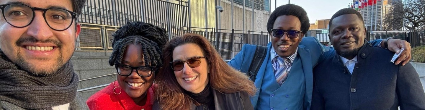 CSPPS members standing in front of the UN