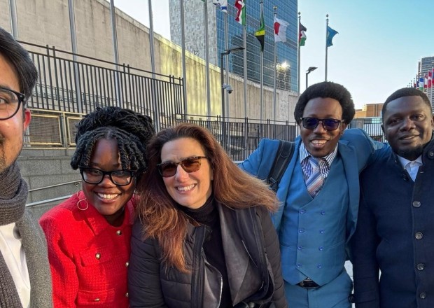 CSPPS members standing in front of the UN