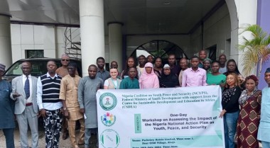 participants standing in front of the building